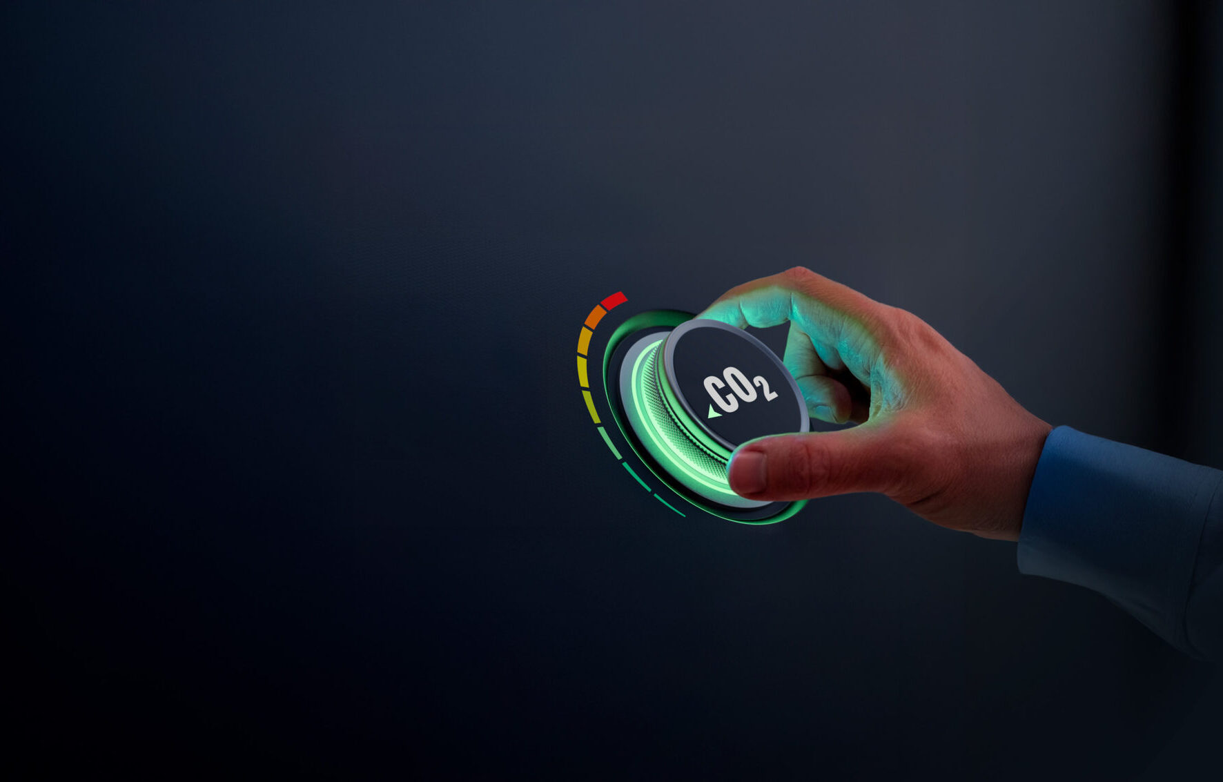 Photo of a hand adjusting a dial labeled "CO2"